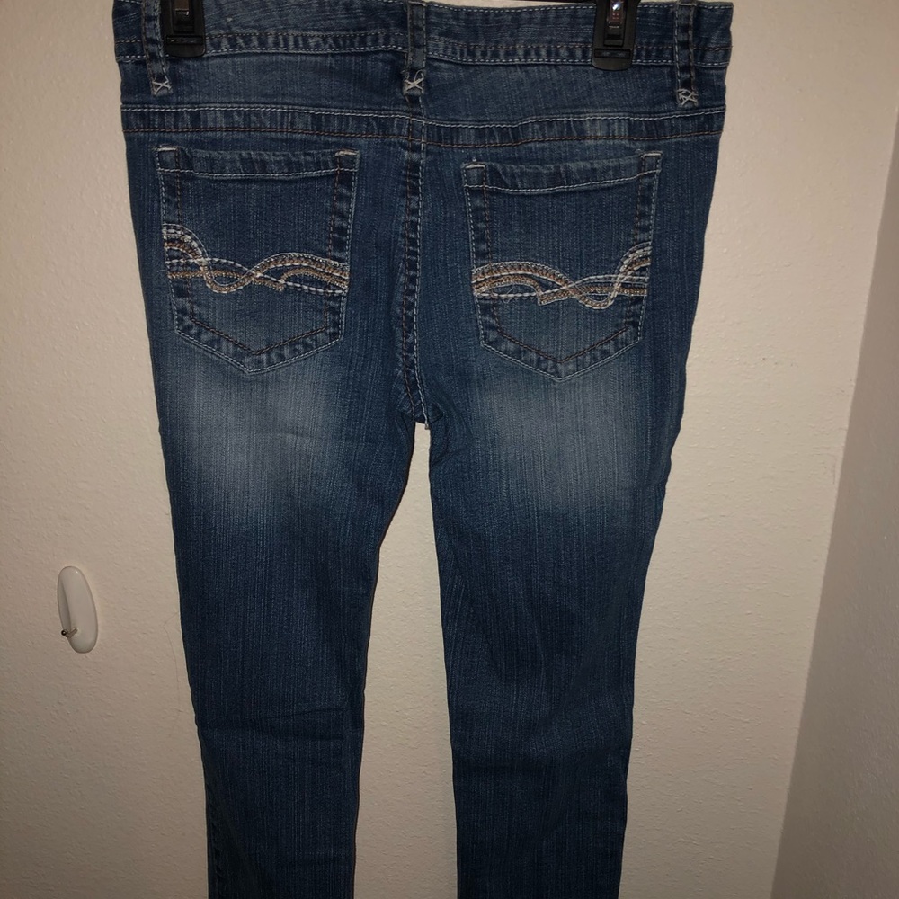 Skinny color distressed jeans